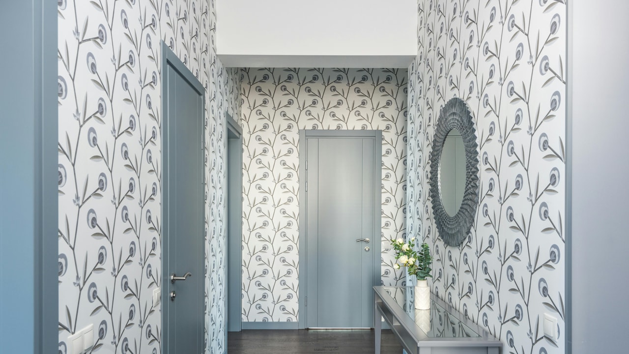 Natural fibre wallpapers like grasscloth add texture and warmth to interiors.