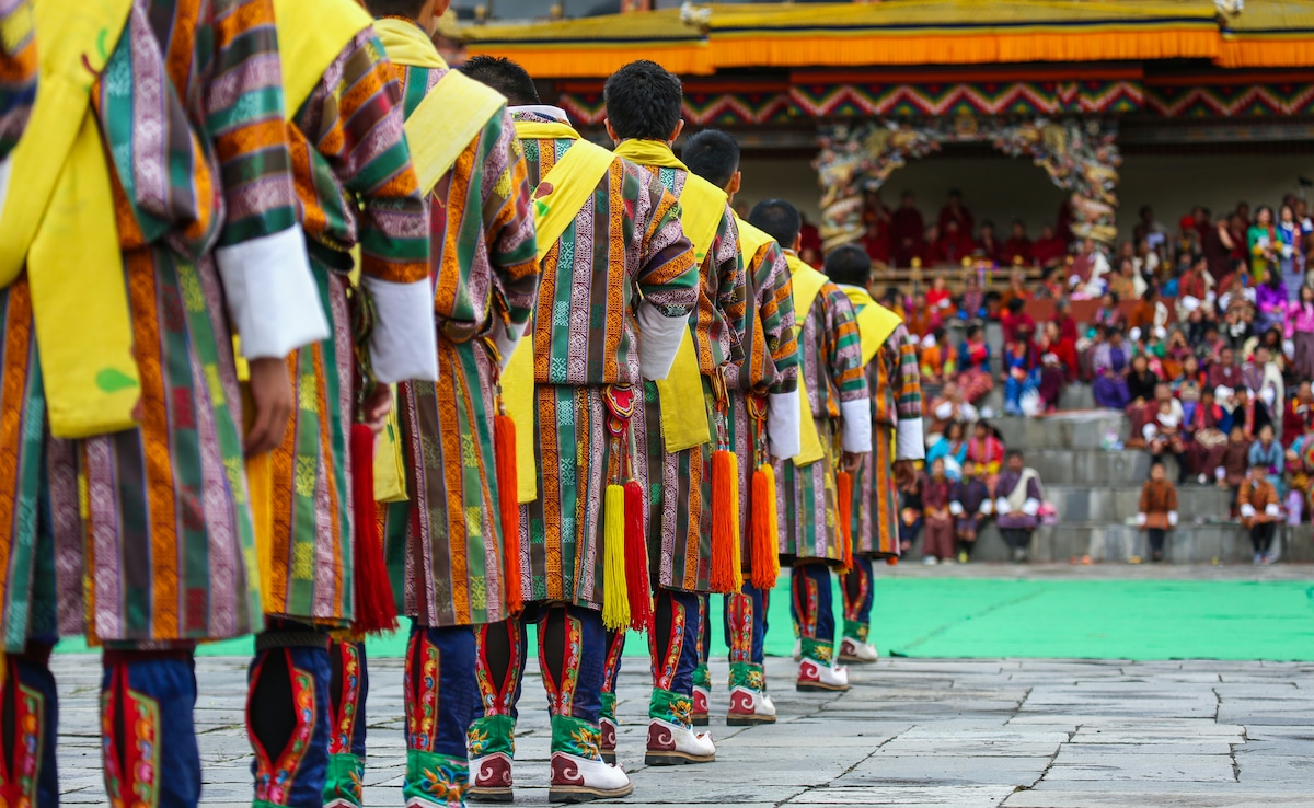 A group of male dancers get ready for a traditional item during Thimphu Tshechu (festival). A group of male dancers get ready for a traditional item during Thimphu Tshechu (festival).
