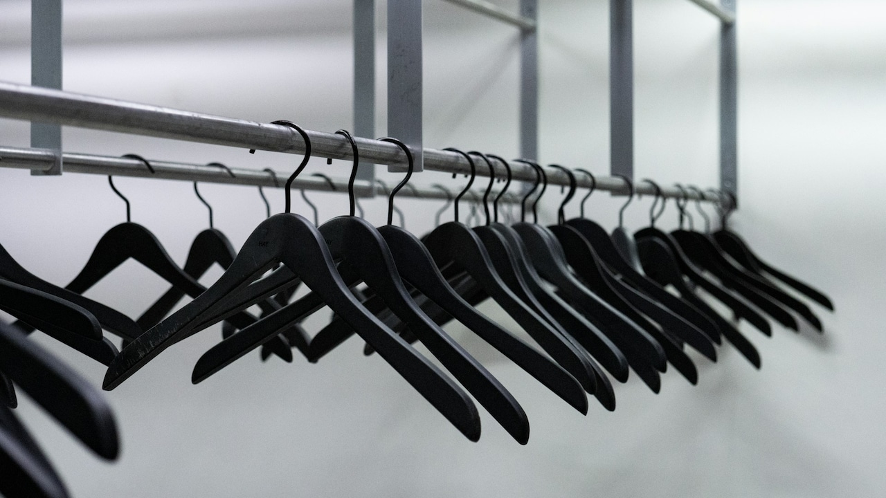 Colour-coordinate your hangers to bring some visual harmony
