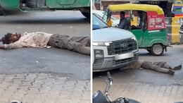 Video: Car Runs Over Man Lying Unconscious On Road In Gurugram