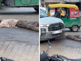 Video: Car Runs Over Man Lying Unconscious On Road In Gurugram Video: Car Runs Over Man Lying Unconscious On Road In Gurugram