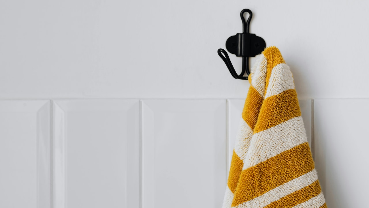 Explore unique wall hooks that dont need drilling to hold your belongings