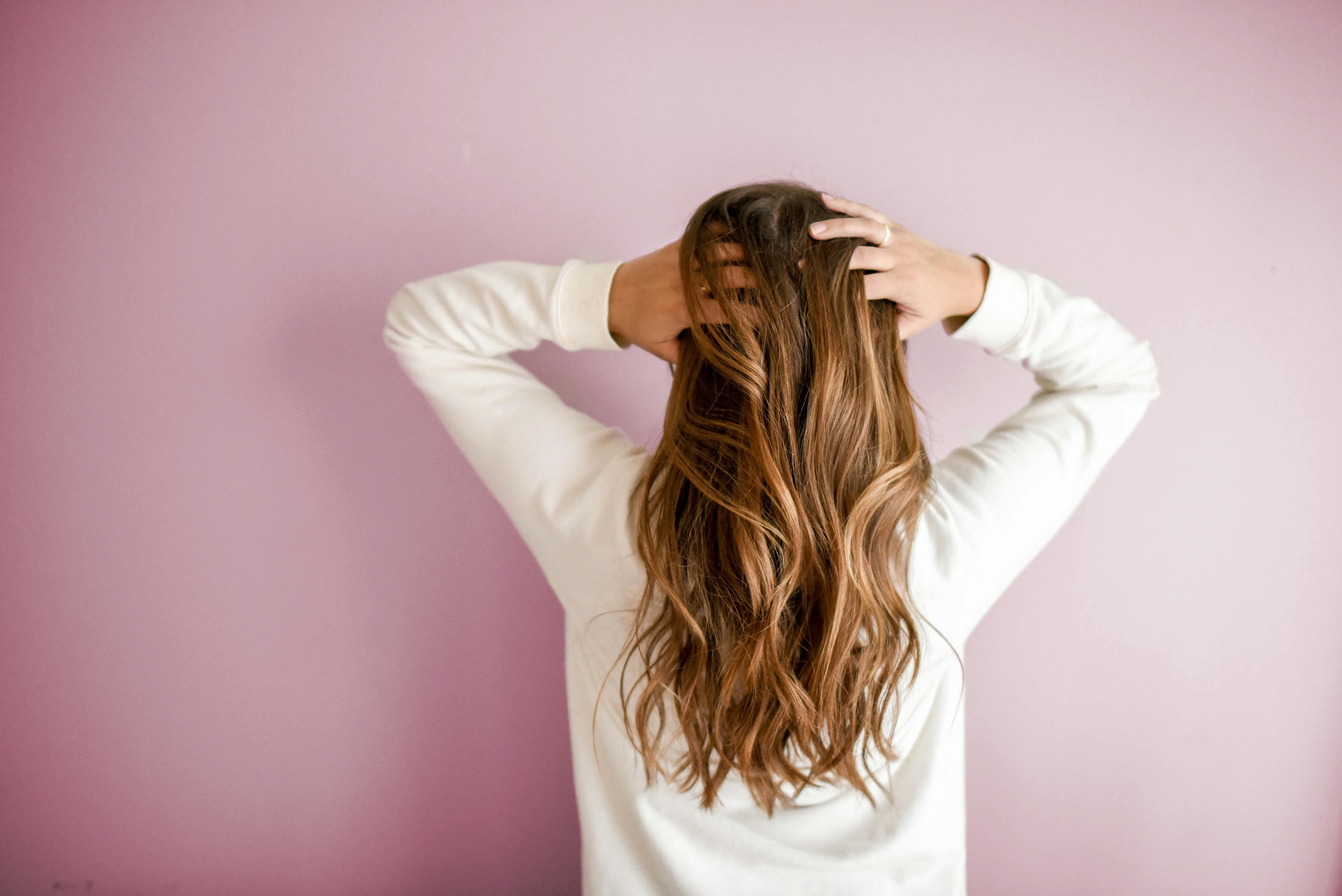 Typically, we shed 50–100 strands of hair per day. Photo: Unsplash Typically, we shed 50–100 strands of hair per day. Photo: Unsplash