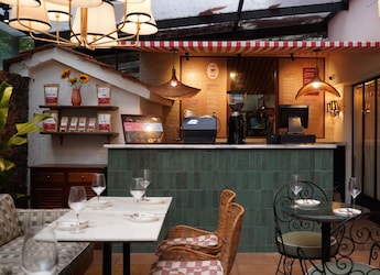 A Look Inside Malaika Arora's New Restaurant: Scarlett House Juhu