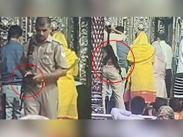 बांके बिहारी मंदिर में VIP कल्चर, मेहमानों के लिए कुर्सी और हथियारों के साथ गर्भगृह में पुलिसकर्मी बांके बिहारी मंदिर में VIP कल्चर, मेहमानों के लिए कुर्सी और हथियारों के साथ गर्भगृह में पुलिसकर्मी