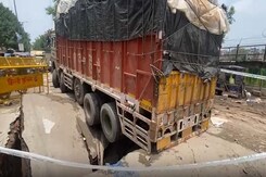 Video: Truck Gets Stuck In Pothole After Part Of Delhi Road Caves In Video: Truck Gets Stuck In Pothole After Part Of Delhi Road Caves In