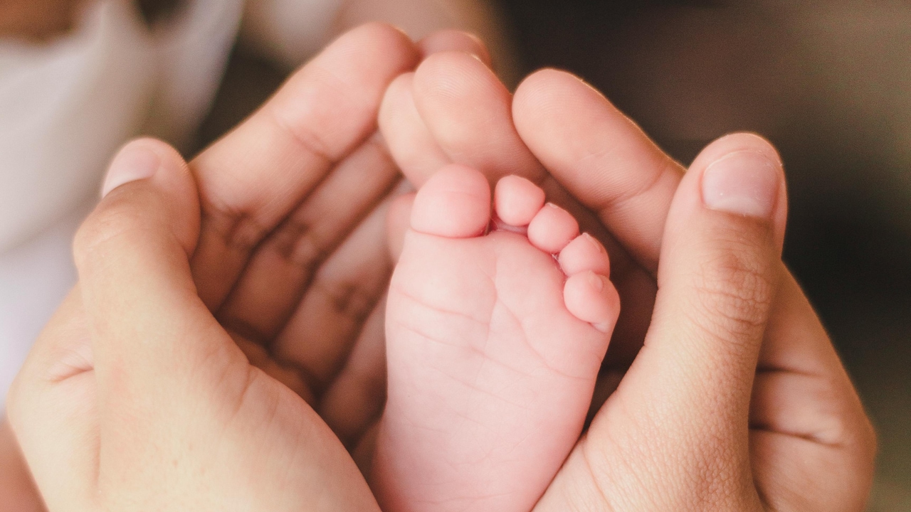 Regular oil massage keeps the baby's skin soft and strengthens bonding.