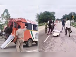 गोंडा में बीच सड़क एंबुलेंस से गिरा शव, इंसानियत को शर्मसार करने वाला वीडियो वायरल गोंडा में बीच सड़क एंबुलेंस से गिरा शव, इंसानियत को शर्मसार करने वाला वीडियो वायरल