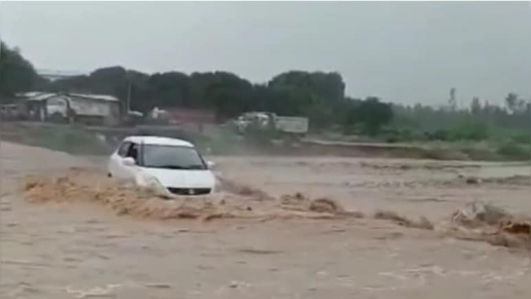 On Camera, Floodwaters In Dehradun Sweep Away Car, Driver Rescued By Locals On Camera, Floodwaters In Dehradun Sweep Away Car, Driver Rescued By Locals