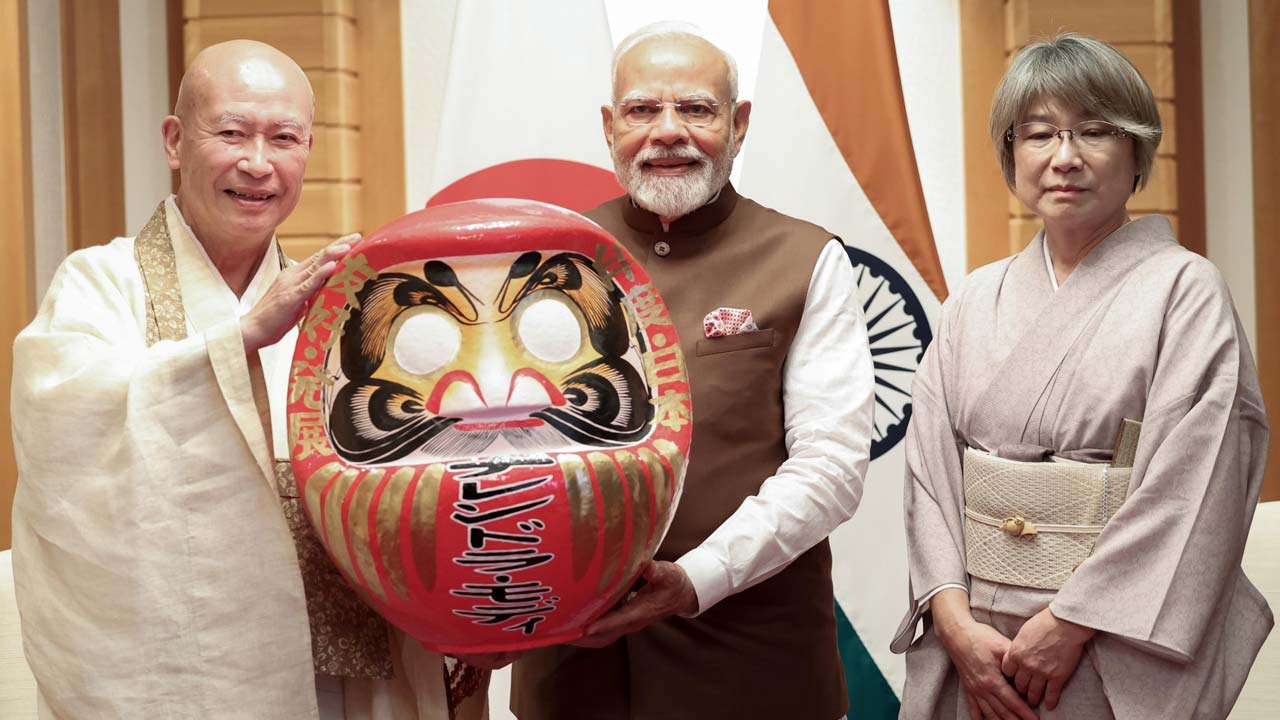 PM Modi Receives A Daruma Doll During His Japan Visit