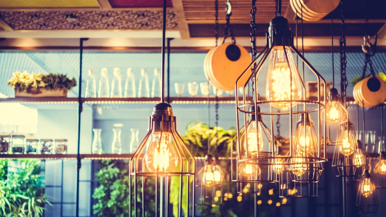 Go for warm lighting to create a soft, cosy, and inviting space instantly