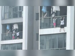 13 व्या मजल्याच्या बाल्कनीबाहेर लटकताना दिसली दोन मुलं; Video पाहून हृदयाचा ठोका चुकेल 13 व्या मजल्याच्या बाल्कनीबाहेर लटकताना दिसली दोन मुलं; Video पाहून हृदयाचा ठोका चुकेल