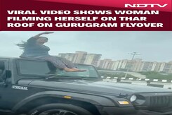 Viral Video Shows Woman Filming Herself On Thar Roof On Gurugram Flyover Viral Video Shows Woman Filming Herself On Thar Roof On Gurugram Flyover