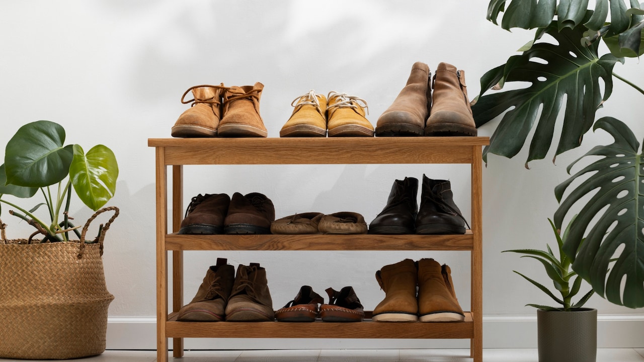 Add a shoe rack to oranise your footwear in one corner 