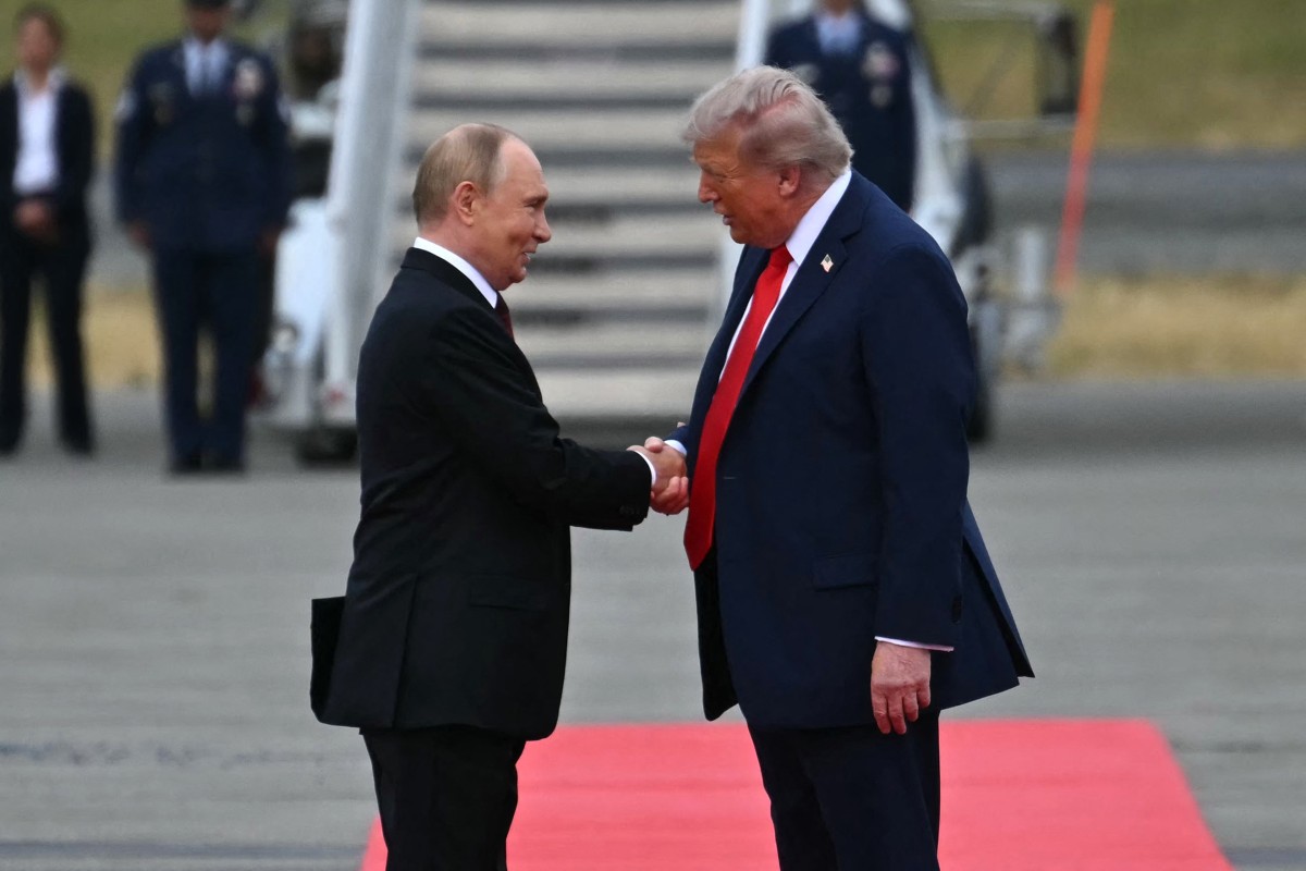 Trump And Putin Share Handshake In Alaska, Ahead Of Talks