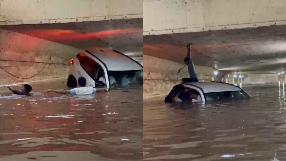 Video: Locals Swim Through Flooded Underpass To Save Stranded Car Passengers