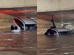 Video: Thane Locals Swim Through Flooded Underpass To Save Stranded Car Passengers