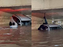 Video: Thane Locals Swim Through Flooded Underpass To Save Stranded Car Passengers Video: Thane Locals Swim Through Flooded Underpass To Save Stranded Car Passengers