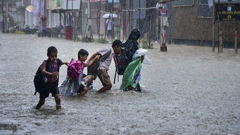 Mumbai Rain Red Alert: Mumbai On Red Alert As Heavy Rainfall Triggers Flood And Traffic Chaos
