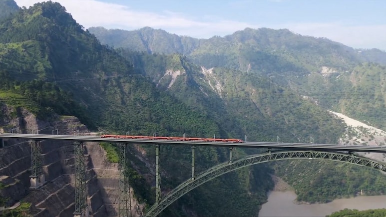 Watch: Vande Bharat Zips Across J&K's Anji, Chenab Bridges Watch: Vande Bharat Zips Across J&K's Anji, Chenab Bridges