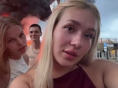 Russian Influencers Arrested For Filming Video In Front Of Burning Oil Depot Hit By Ukraine Strike