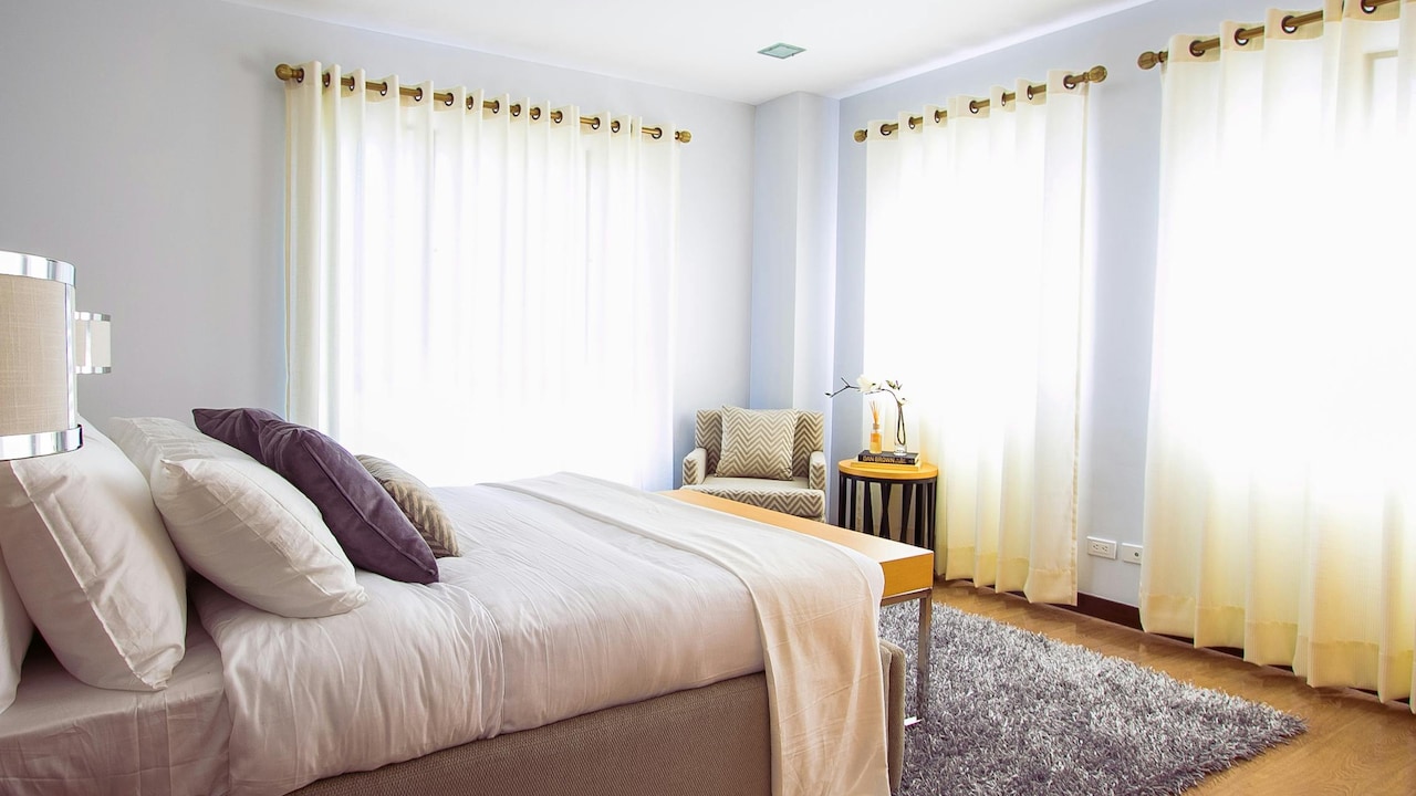 For windows facing the harsh afternoon sun, consider wider rods and extra fabric