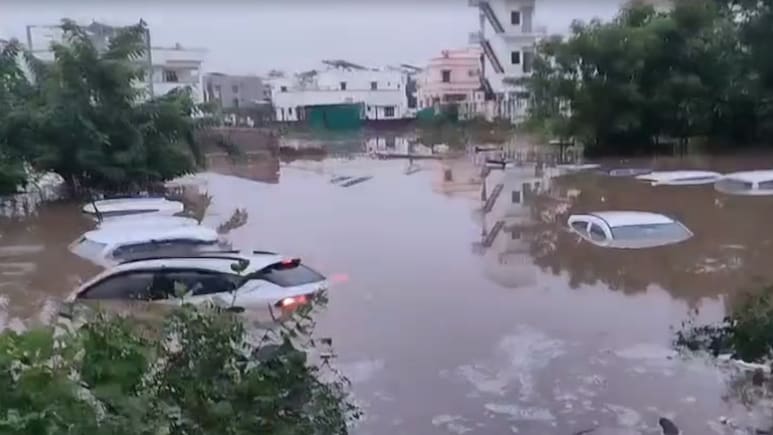 Cars Submerged, Houses Flooded After Heavy Rain In Gujarat's Himmatnagar Cars Submerged, Houses Flooded After Heavy Rain In Gujarat's Himmatnagar