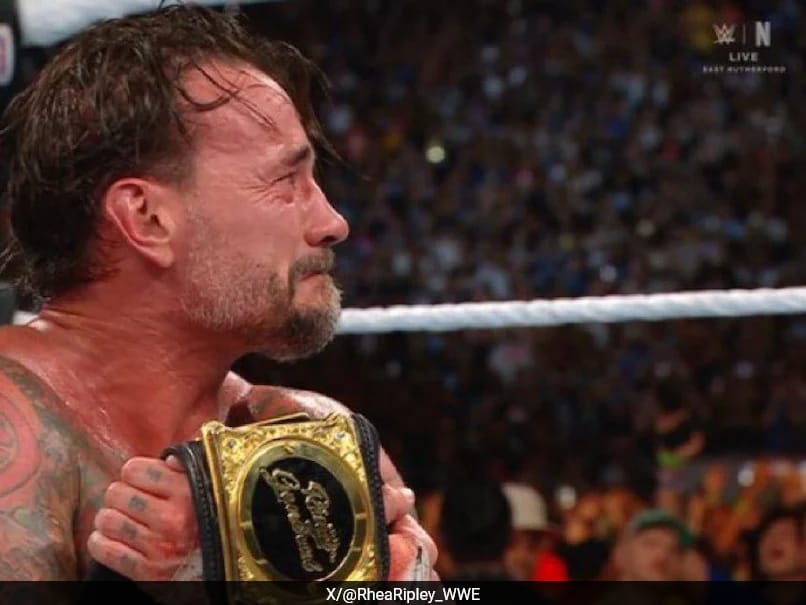CM Punk Stunned As 'Injured' Seth Rollins Cashes Money In The Bank, Snatches World Heavyweight Title