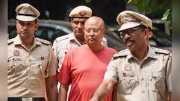On Delhi Sleaze Baba's Phone: Pics With Air Hostesses, Profile Pic Screenshots