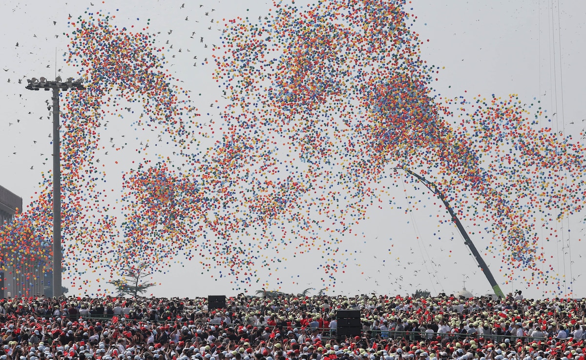 Balloons are released during a military parade to mark the 80th anniversary of the end of World War Two, in Beijing. Balloons are released during a military parade to mark the 80th anniversary of the end of World War Two, in Beijing.