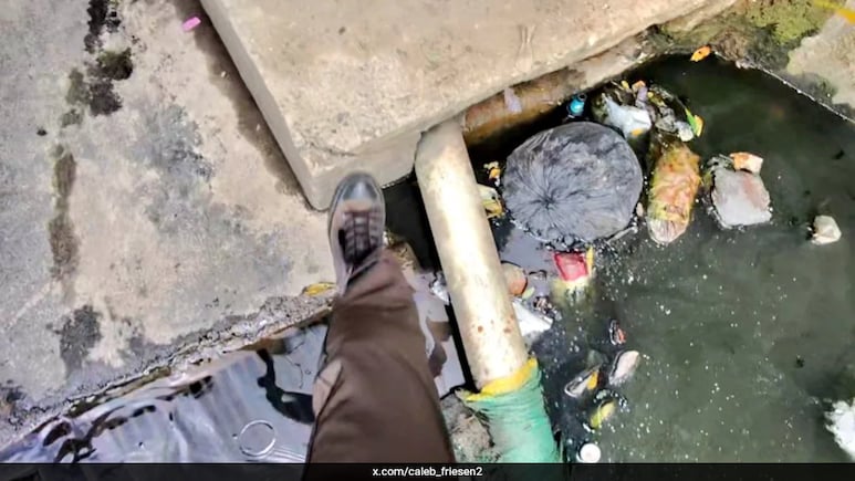 Canadian Man's Viral Video Highlights Bengaluru's Footpath Hazards Canadian Man's Viral Video Highlights Bengaluru's Footpath Hazards