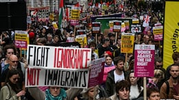 Pics: Thousands Gather For Anti-Immigration March, Counter Protest In London