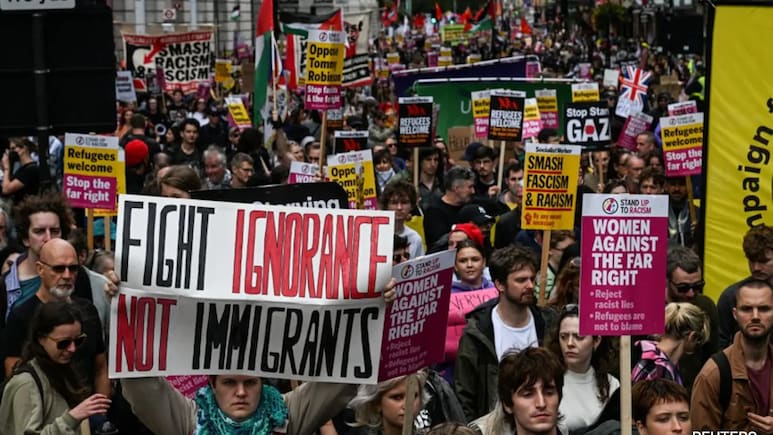 Pics: Thousands Gather For Anti-Immigration March, Counter Protest In London