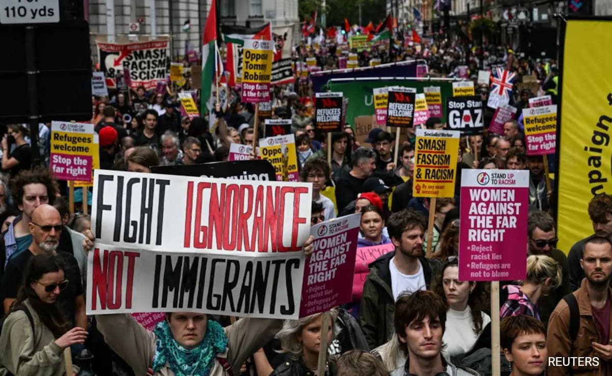 Pics: Thousands Gather For Anti-Immigration March, Counter Protest In London