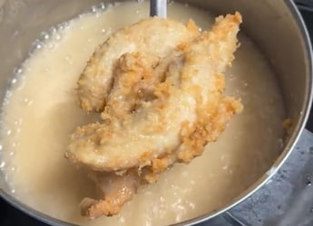Viral Video: Woman Makes Fried Chicken By Mixing Flour Directly Into Oil, Internet Reacts Viral Video: Woman Makes Fried Chicken By Mixing Flour Directly Into Oil, Internet Reacts