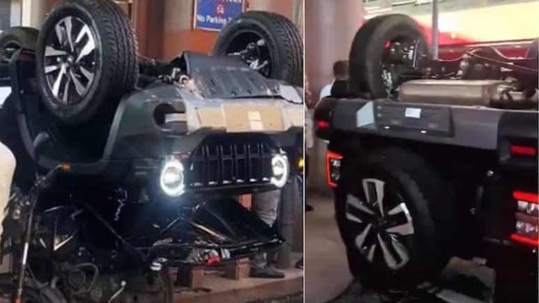 Viral Video: Woman Drives New Mahindra Thar Roxx Off Showroom's First-Floor Viral Video: Woman Drives New Mahindra Thar Roxx Off Showroom's First-Floor