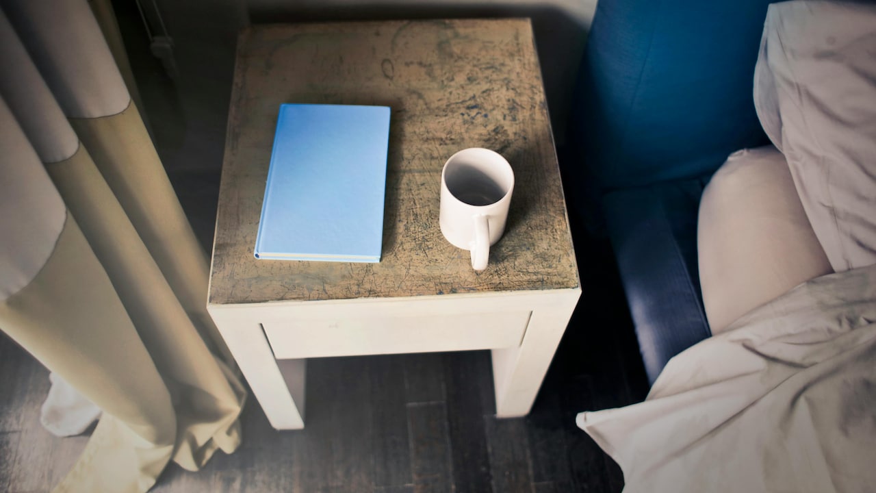 Get a modern side table that doubles as the perfect coffee companion