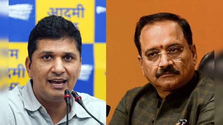दुर्गा पंडाल में पीएम मोदी की तस्वीर लगाए जाने पर सियासत गर्म, बीजेपी ने आप पर किया पलटवार दुर्गा पंडाल में पीएम मोदी की तस्वीर लगाए जाने पर सियासत गर्म, बीजेपी ने आप पर किया पलटवार