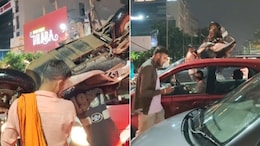 Watch: Gurugram Man Lifts Scooter Over Head To Beat Traffic Jam
