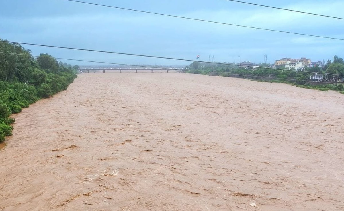 Nearly all rivers and streams flowing above the flood mark (PTI photo) Nearly all rivers and streams flowing above the flood mark (PTI photo)