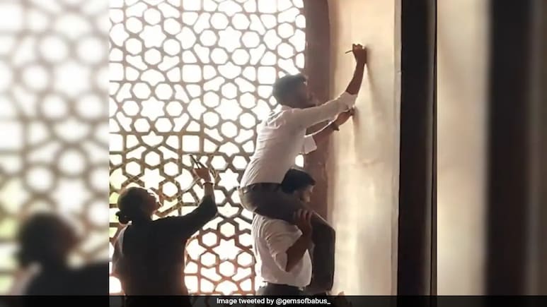 Visitors Caught Scratching Their Names On Walls Of Humayun's Tomb, Video Sparks Outrage Visitors Caught Scratching Their Names On Walls Of Humayun's Tomb, Video Sparks Outrage