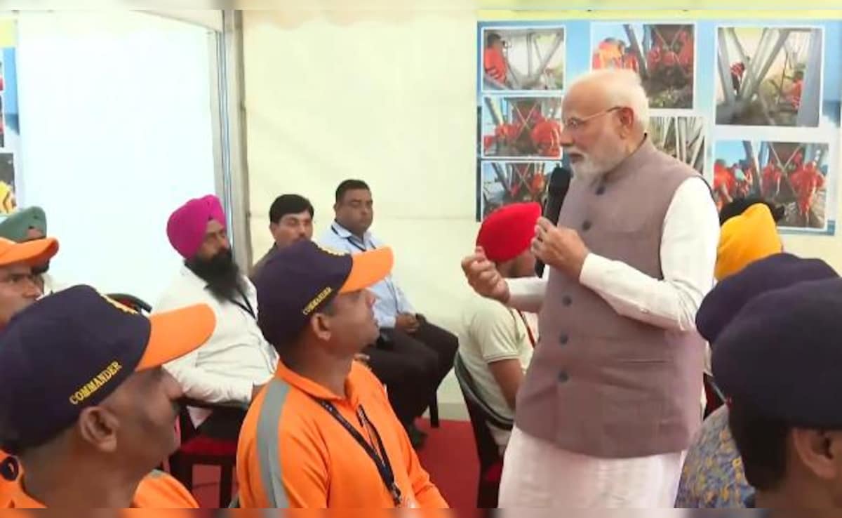After aerial survey of flood-affected areas, PM Modi also interacted with NDRF teams in Gurdaspur. After aerial survey of flood-affected areas, PM Modi also interacted with NDRF teams in Gurdaspur.