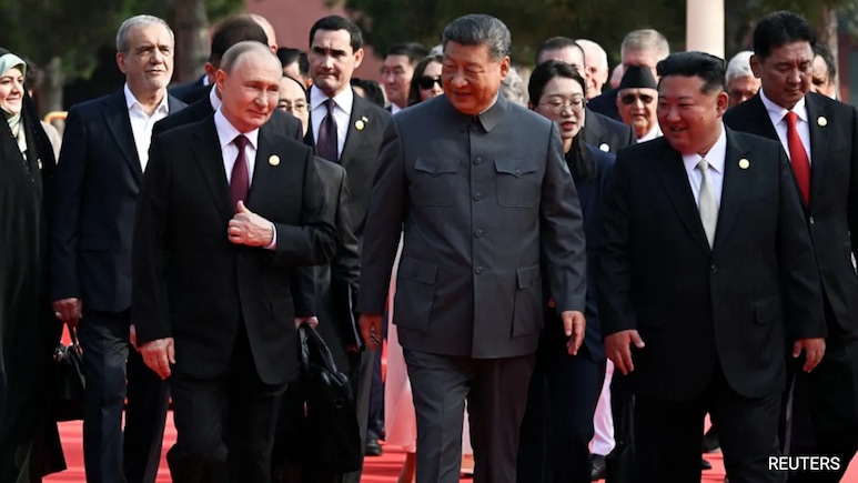 Xi's Show Of Unity With Putin, Kim Could Complicate China's Diplomatic Balance