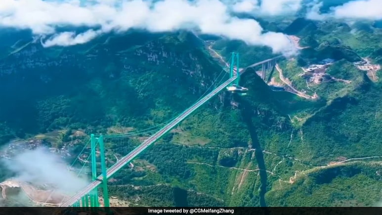 Watch: World's Tallest Bridge Opens In China, Cuts Travel Time From 2 Hours To 2 Minutes Watch: World's Tallest Bridge Opens In China, Cuts Travel Time From 2 Hours To 2 Minutes
