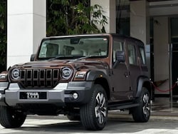 Thar crashes out of Delhi showroom, lands on road below