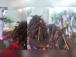 Rajasthan: मूसलाधार बारिश से दौसा में बाढ़ जैसे हालात, पानी में डूबे श्मशान घाट में अंतिम संस्कार Rajasthan: मूसलाधार बारिश से दौसा में बाढ़ जैसे हालात, पानी में डूबे श्मशान घाट में अंतिम संस्कार