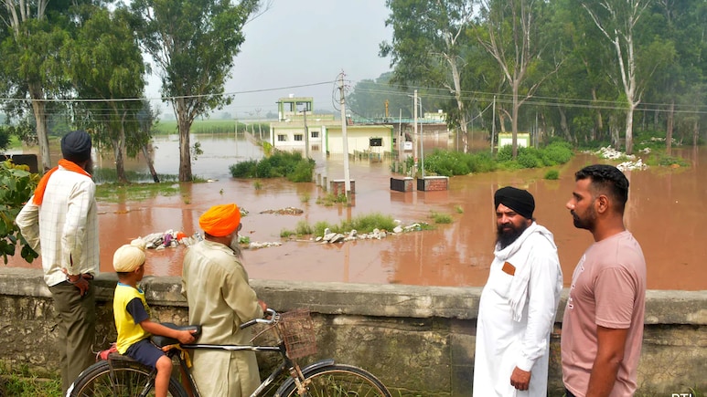 In Pics: Heavy Rain, Floods Ravage Parts Of North India In Pics: Heavy Rain, Floods Ravage Parts Of North India