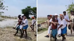 "Unwell" Congress MP Tariq Anwar Carried By Villagers For Flood Inspection In Bihar