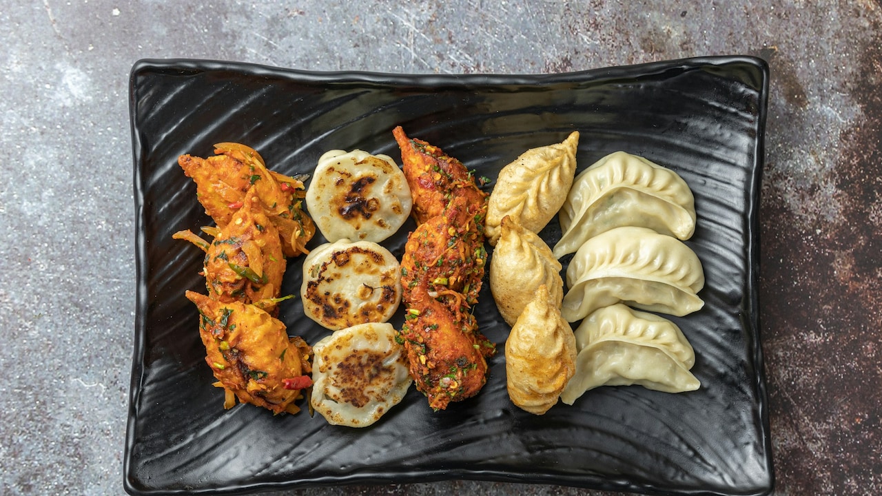 Electric cookers help prepare delicious cheat day snacks such as steam momos