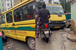 Another School Bus Gets Stuck On Bengaluru Roads, Lands Into An Open Drain Another School Bus Gets Stuck On Bengaluru Roads, Lands Into An Open Drain
